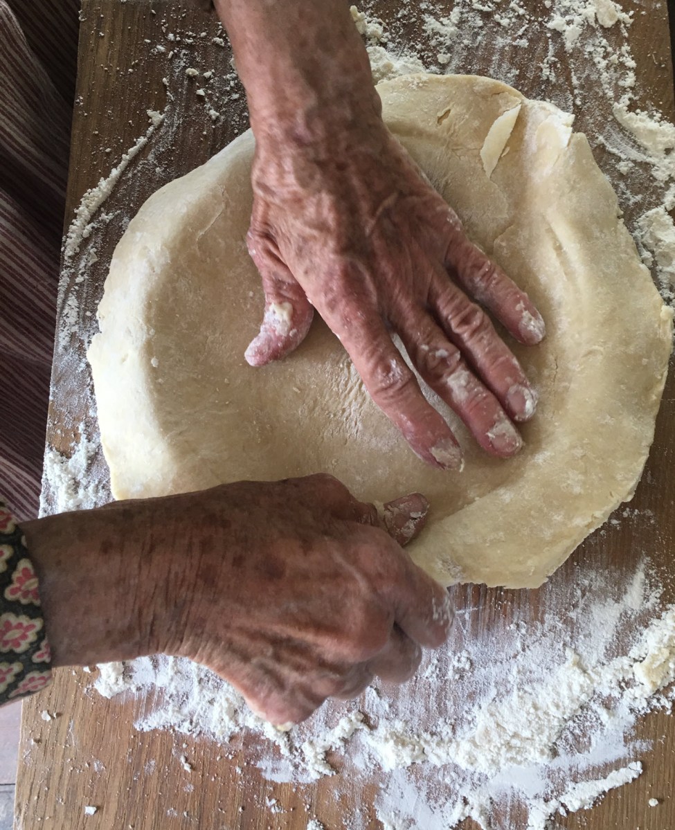 Smooth crust into pie plate
