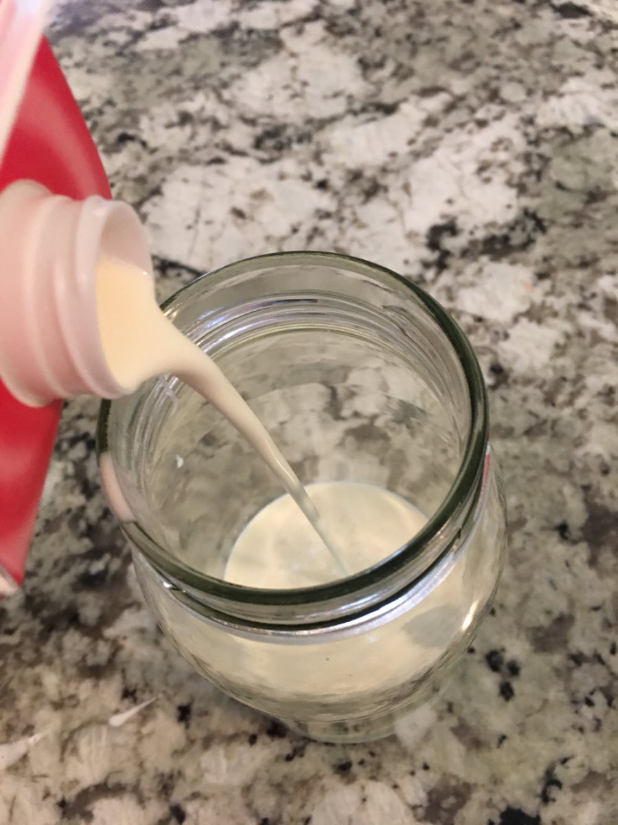 Pour cream half way up jar