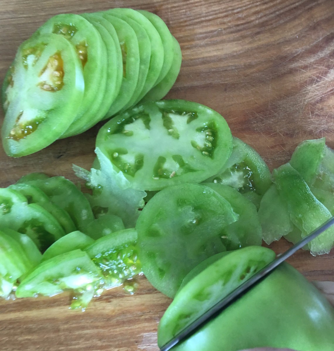 Slice tomatoes thin